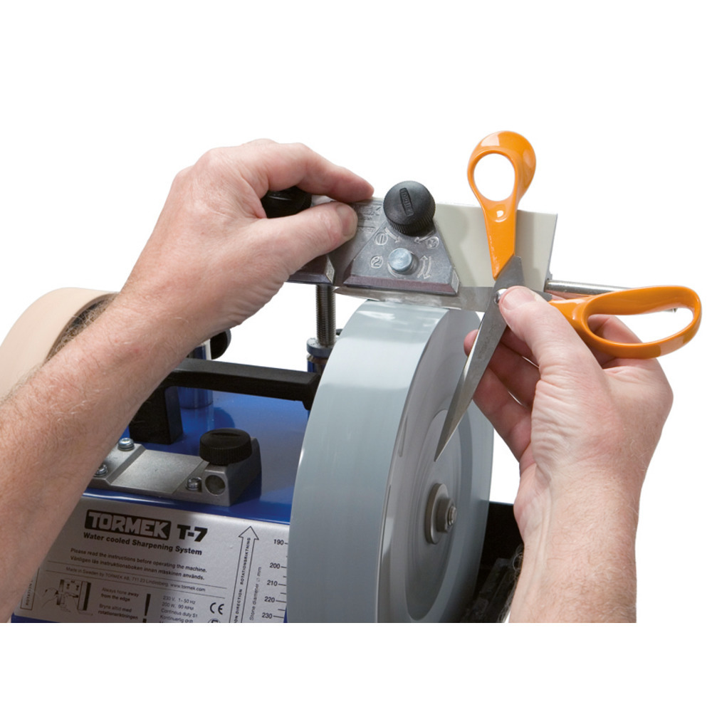 Dispositif d'affûtage pour ciseaux