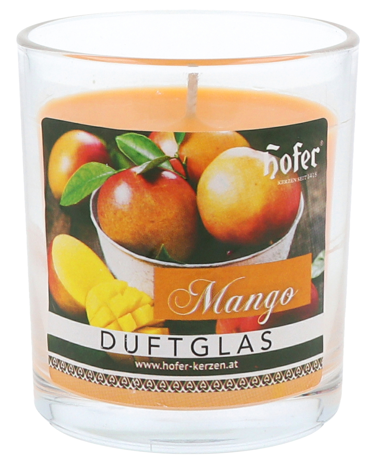 Scented candle in a glass jar, mango  Scented candle in a glass jar, mango